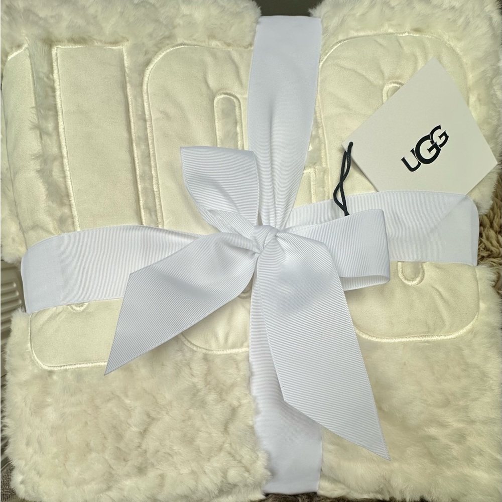 UGG Cream Fuzzy Blanket with White Ribbon